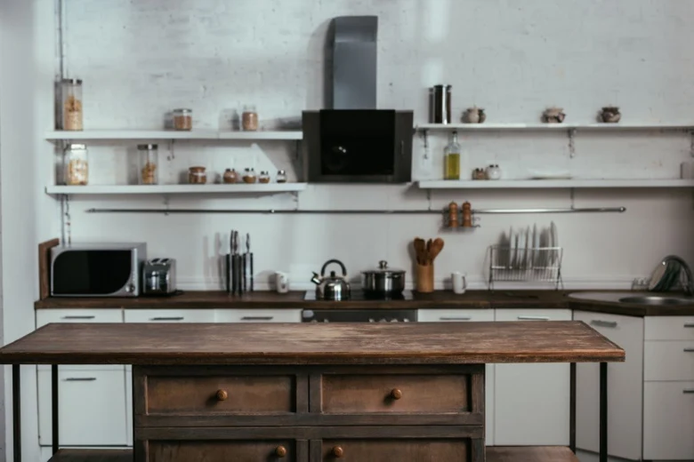 Kitchen with dark countertop