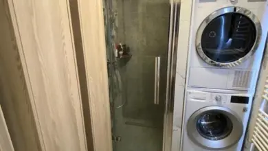 Renovated bathroom with laundry and shower