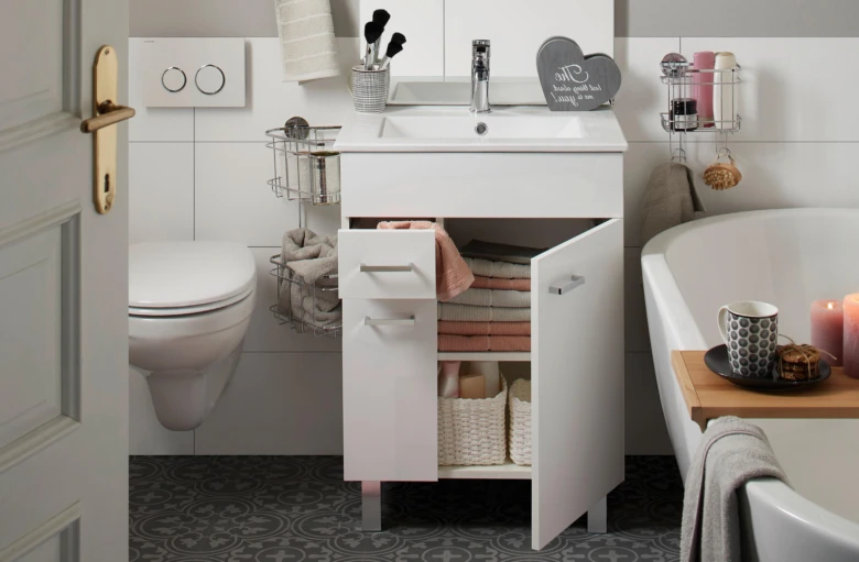 White bathroom with wood accents
