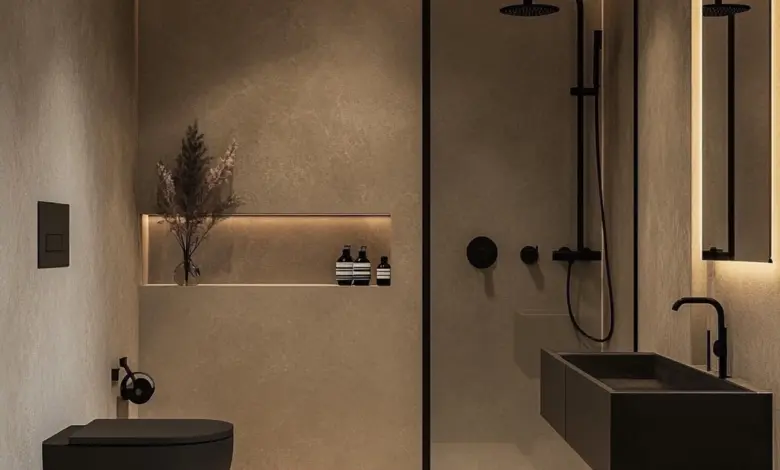 Moderní koupelna s černým toaletem, umyvadlem a sprchou v minimalistickém designu.