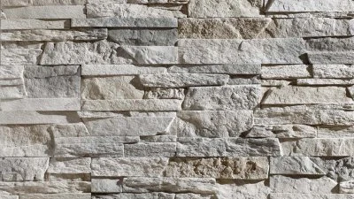 Textura kamenných obkladů pro komín v interiéru i exteriéru.